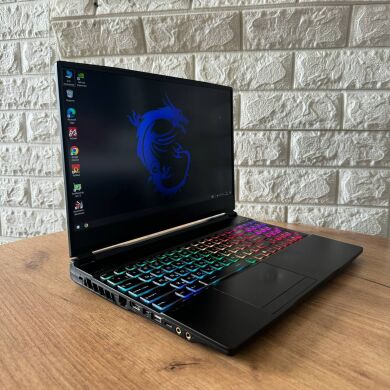 Игровой ноутбук MSI Raider GE65 9SF / 15.6" (1920x1080) IPS / Intel Core i7-9750H (6 (12) ядер по 2.6 - 4.5 GHz) / 16 GB DDR4 / 512 GB SSD / nVidia GeForce RTX 2070, 8 GB GDDR6, 256-bit / WebCam