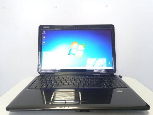 Ноутбук Asus K50IJ / 15.6" (1366x768) TN / Intel Pentium T4400 (2 ядра по 2.2 GHz) / 4 GB DDR2 / 300 GB HDD / nVidia GeForce G205M / WebCam / АКБ не держит Ноутбук Asus K50IJ / 15.6" (1366x768) TN / Intel Pentium T4400 (2 ядра по 2.2 GHz) / 4 GB DDR2 / 300 GB HDD / nVidia GeForce G205M / WebCam / АКБ не держит