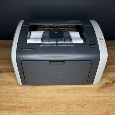 Принтер НР LaserJet 1010 Printer / Лазерний монохромний друк / 600x600 dpi / A4 / 12 стор/хв / USB 2.0 / Дуплекс / Кабелі в комплекті