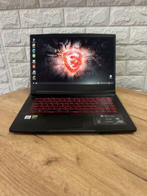 Ігровий ноутбук MSI GF65 Thin 10SDR / 15.6" (1920x1080) IPS / Intel Core i7-10750H (6 (12) ядер по 2.6 - 5.0 GHz) / 8 GB DDR4 / 512 GB SSD / nVidia GeForce GTX 1660 Ti, 6 GB GDDR6, 192-bit / WebCam Ігровий ноутбук MSI GF65 Thin 10SDR / 15.6" (1920x1080) IPS / Intel Core i7-10750H (6 (12) ядер по 2.6 - 5.0 GHz) / 8 GB DDR4 / 512 GB SSD / nVidia GeForce GTX 1660 Ti, 6 GB GDDR6, 192-bit / WebCam