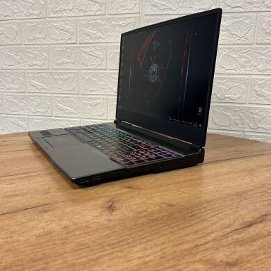 Игровой ноутбук Б-класс MSI GP65 Leopard 10SFK / 15.6" (1920x1080) IPS / Intel Core i7-10750H (6 (12) ядер по 2.6 - 5.0 GHz) / 32 GB DDR4 / 512 GB SSD NVMe / nVidia GeForce RTX 2070, 8 GB GDDR6, 256-bit / WebCam