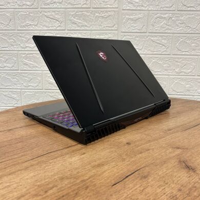 Игровой ноутбук Б-класс MSI GP65 Leopard 10SFK / 15.6" (1920x1080) IPS / Intel Core i7-10750H (6 (12) ядер по 2.6 - 5.0 GHz) / 32 GB DDR4 / 512 GB SSD NVMe / nVidia GeForce RTX 2070, 8 GB GDDR6, 256-bit / WebCam
