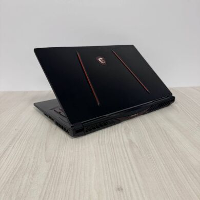 Ігровий ноутбук Б-клас MSI GE75 Raider 10SF / 17.3" (1920x1080) IPS / Intel Core i7-10750H (6 (12) ядер по 2.6 - 5.0 GHz) / 16 GB DDR4 / 512 GB SSD NVMe + 1000 GB HDD / nVidia GeForce RTX 2070, 8 GB GDDR6, 256-bit / WebCam Ігровий ноутбук Б-клас MSI GE75 Raider 10SF / 17.3" (1920x1080) IPS / Intel Core i7-10750H (6 (12) ядер по 2.6 - 5.0 GHz) / 16 GB DDR4 / 512 GB SSD NVMe + 1000 GB HDD / nVidia GeForce RTX 2070, 8 GB GDDR6, 256-bit / WebCam