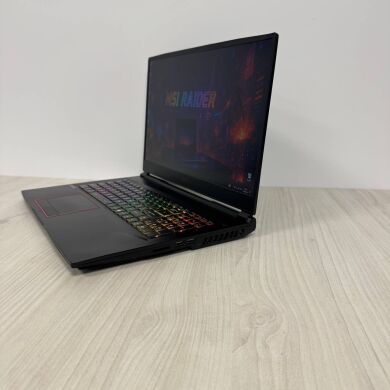 Ігровий ноутбук Б-клас MSI GE75 Raider 10SF / 17.3" (1920x1080) IPS / Intel Core i7-10750H (6 (12) ядер по 2.6 - 5.0 GHz) / 16 GB DDR4 / 512 GB SSD NVMe + 1000 GB HDD / nVidia GeForce RTX 2070, 8 GB GDDR6, 256-bit / WebCam Ігровий ноутбук Б-клас MSI GE75 Raider 10SF / 17.3" (1920x1080) IPS / Intel Core i7-10750H (6 (12) ядер по 2.6 - 5.0 GHz) / 16 GB DDR4 / 512 GB SSD NVMe + 1000 GB HDD / nVidia GeForce RTX 2070, 8 GB GDDR6, 256-bit / WebCam