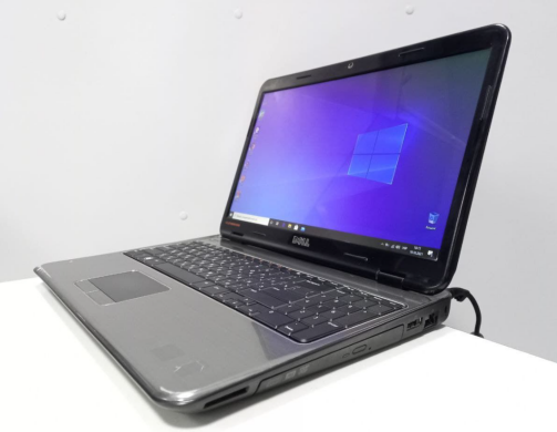 Ноутбук Dell N5010 / 15.6" (1366x768) TN LED / Intel Core i3-350M (2 (4) ядра по 2.26 GHz) / 6 GB DDR3 / 500 GB HDD / AMD Radeon HD 5000 1 GB / WebCam / DVD-RW / HDMI / батарея держит заряд 0 минут