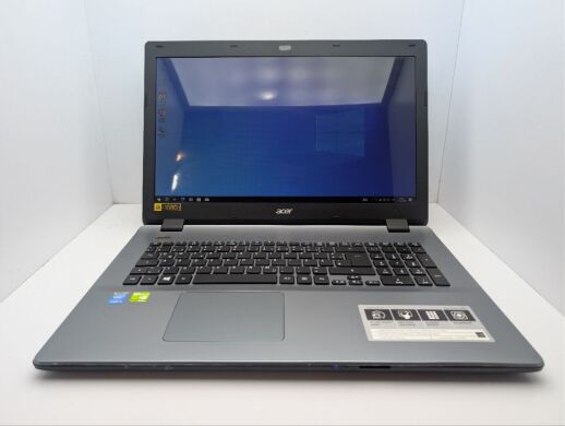 Ноутбук Acer Aspire E5-571G / 17.3" (1600x900) TN / Intel Core i5-4210U (2 (4) ядра по 1.7 - 2.7 GHz) / 8 GB DDR3 / 240 GB SSD / nVidia GeForce 840M, 2 GB GDDR3, 64-bit / WebCam / DVD-ROM Ноутбук Acer Aspire E5-571G / 17.3" (1600x900) TN / Intel Core i5-4210U (2 (4) ядра по 1.7 - 2.7 GHz) / 8 GB DDR3 / 240 GB SSD / nVidia GeForce 840M, 2 GB GDDR3, 64-bit / WebCam / DVD-ROM