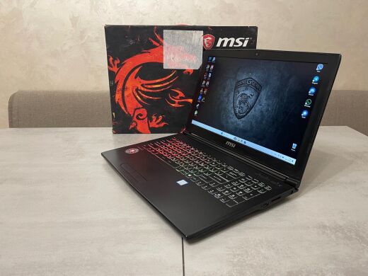 Игровой ноутбук MSI GP62MVR 7RFX Leopard Pro / 15.6" (1920x1080) IPS / Intel Core i7-7700HQ (4 (8) ядра по 2.8 - 3.8 GHz) / 16 GB DDR4 / 256 GB SSD + 1000 GB HDD / nVidia GeForce GTX 1060, 6 GB GDDR5, 192-bit / WebCam